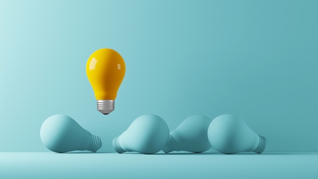 Light bulb yellow floating outstanding among lightbulb light blue on background Premium Photo