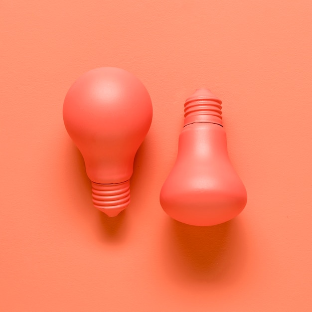 Light bulbs on red background