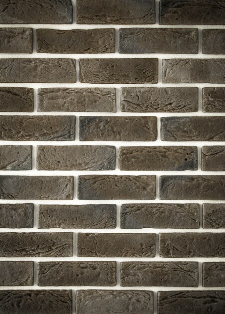 light gray brick wall, creative back-phonon closeup