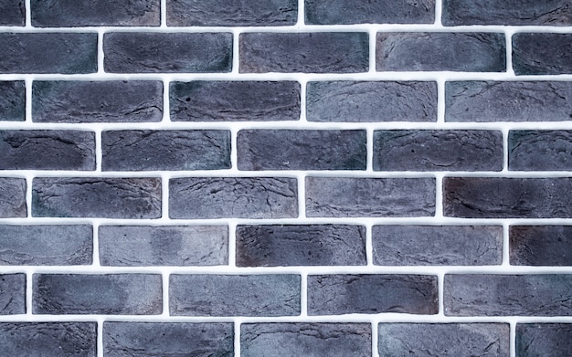 밝은 회색 벽돌 벽