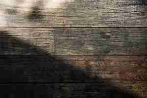 Бесплатное фото Свет на выветривания деревянной доске текстурированный фон