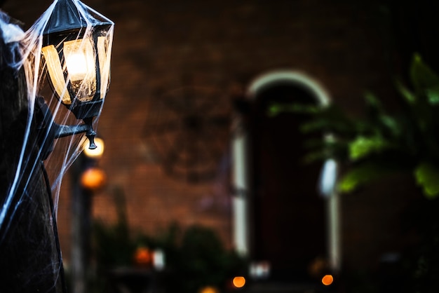 Light post with spiderweb on Halloween