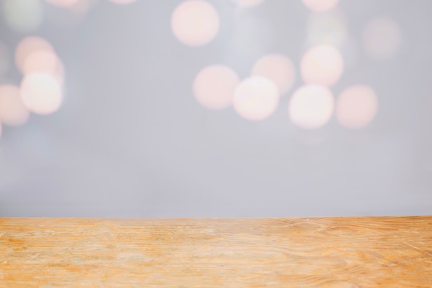 Light wood tabletop on abstract background