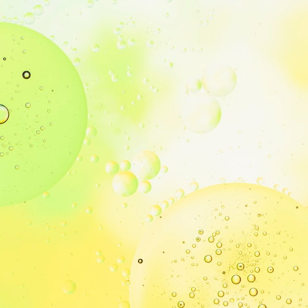 Lime lemonade background with bubbles and raindrops