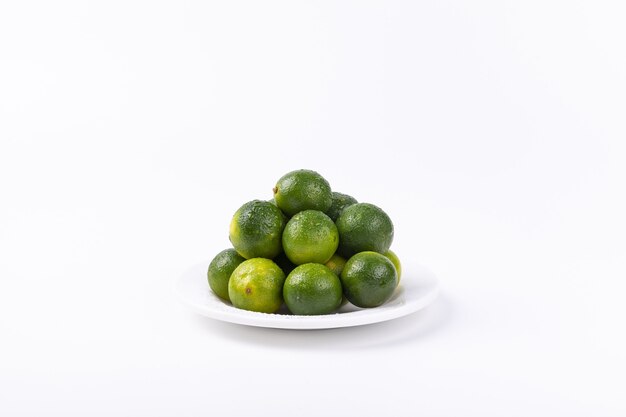 Limes isolated on a white scene