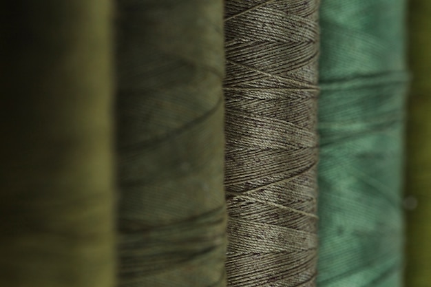 Line of green thread reels