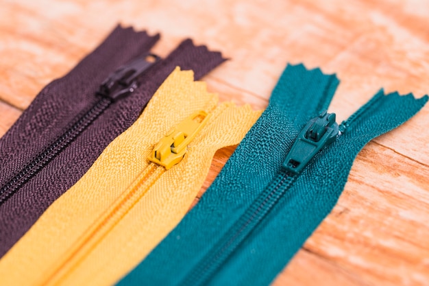 Line of three different zips