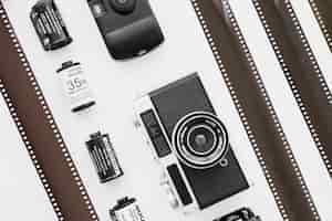 Free photo lines of cameras and cartridges near film