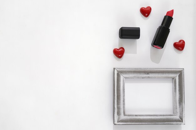 Lipstick, hearts and frame