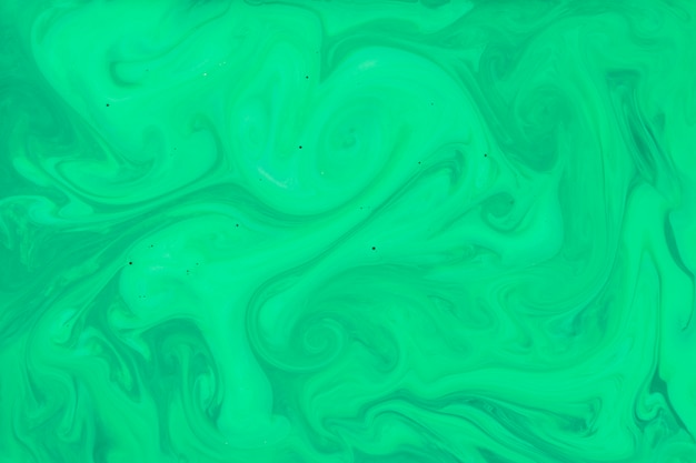 Liquid lime green marble texture background