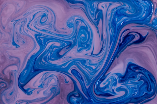 Liquid marble abstract blue and pink background