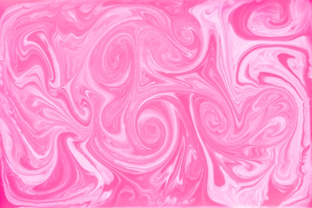 Liquid pink swirl paint marbling backdrop