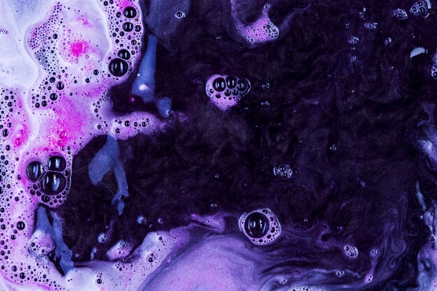 liquid with purple foam