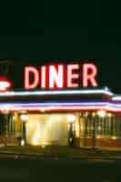 Free photo lit diner place in the city at night