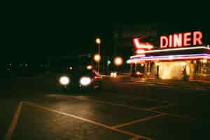 Free photo lit diner place in the city at night