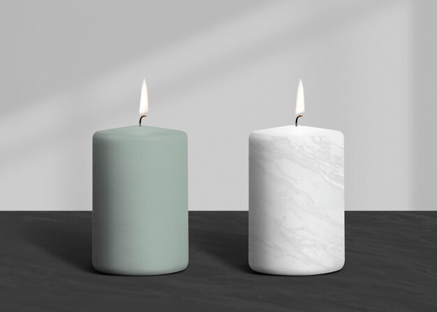 Зажженные ароматические свечи в дизайне из зеленого и белого мрамора