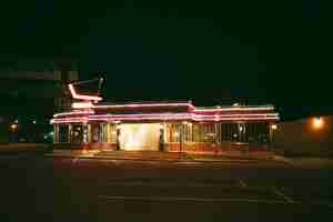 Free photo lit store in the city at night