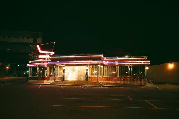 Lit store in the city at night