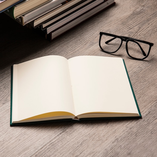 Literature concept with glasses next to book