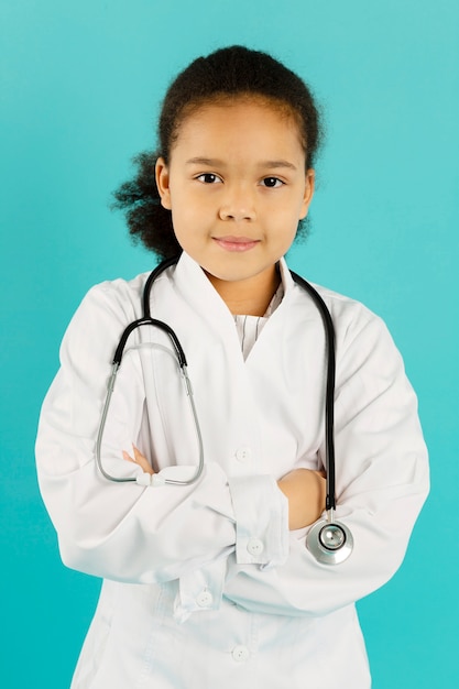 Free photo little afroamerican doctor front view