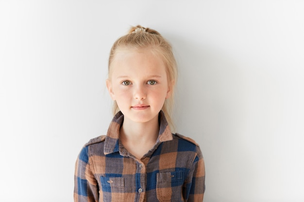 little blonde girl wearing striped shirt