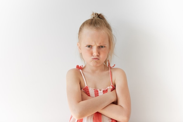 Little blonde girl wearing sundress