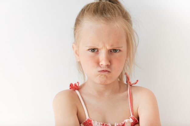 Little blonde girl wearing sundress