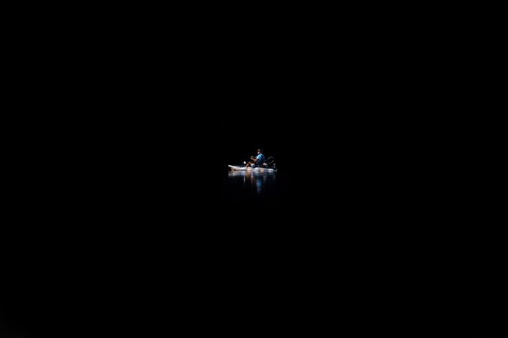Free Photo a little boat in the dark