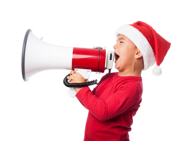 Little boy giving orders with a megaphone