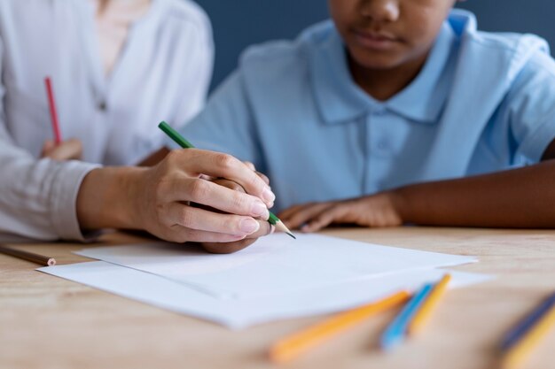 Little boy having an occupational therapy session with a psychologist