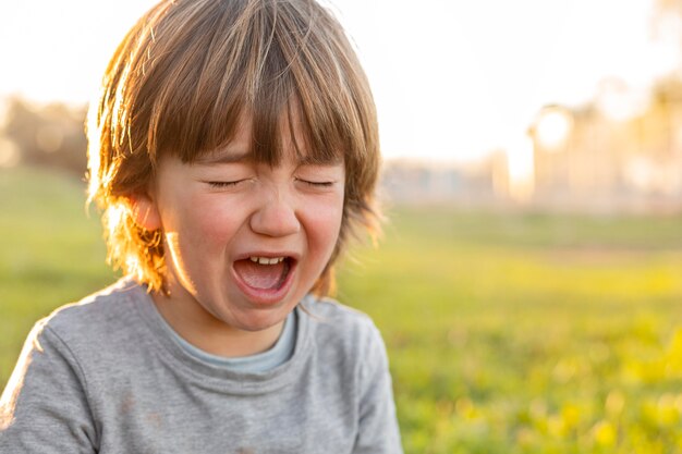 Little boy outdoor crying