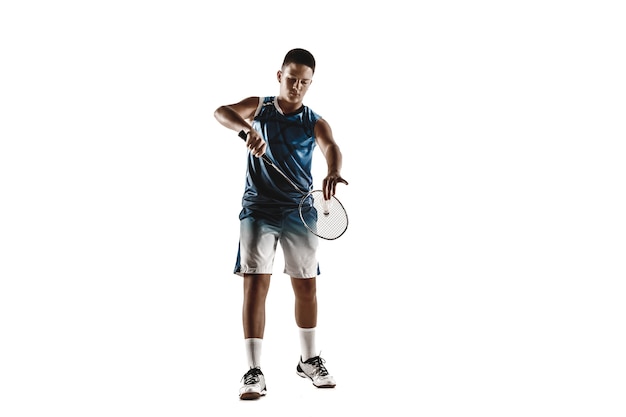 Little boy playing badminton isolated on white  background.