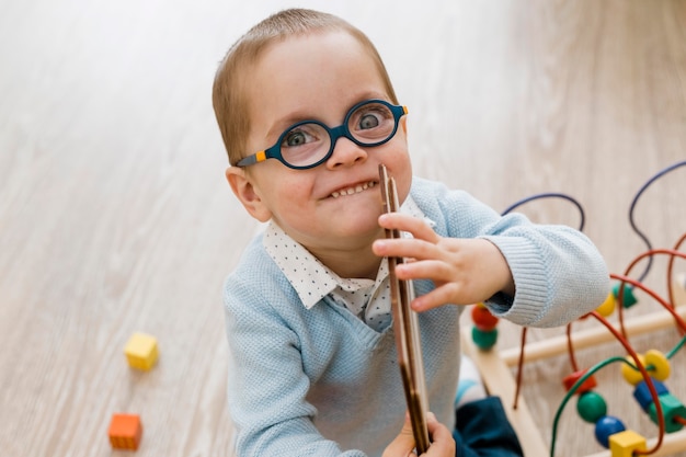 Free photo little boy playing portrait