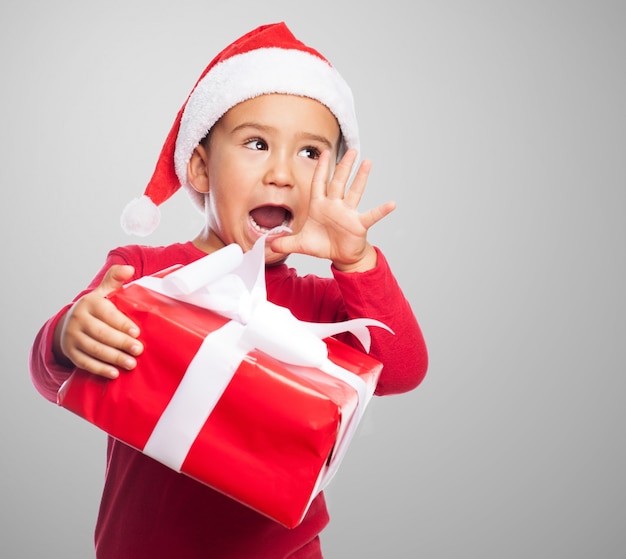 Little boy screaming with his gift