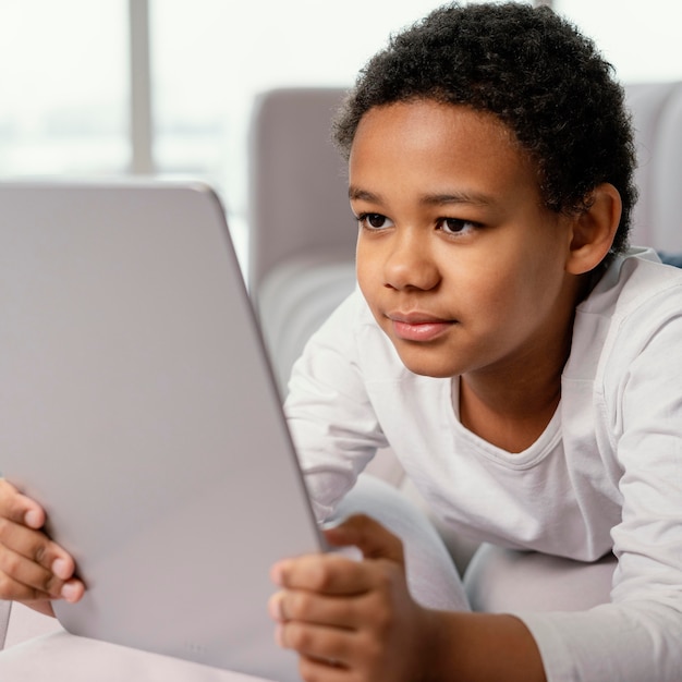 Little boy using tablet