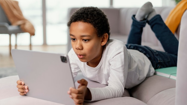 Little boy using tablet