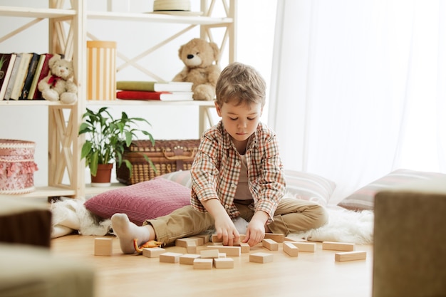 Little child sitting on the floor