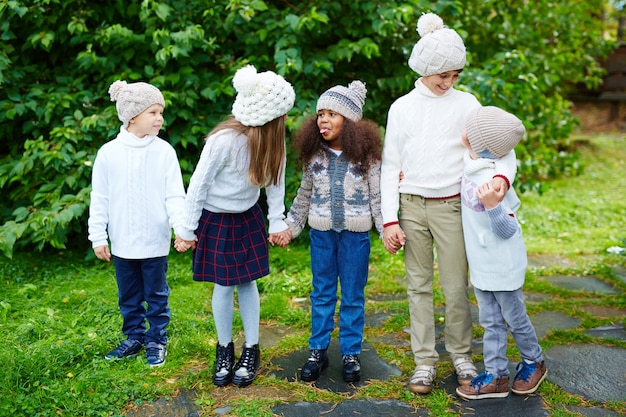 Little Children Playing Outdoors