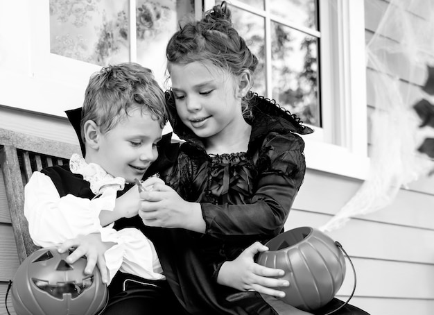 Free photo little children trick or treating