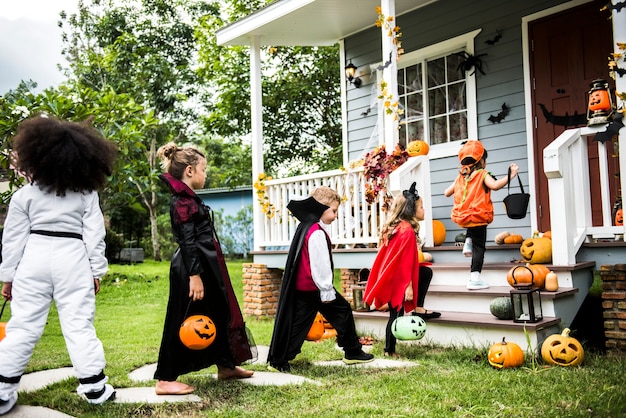 Free photo little children trick or treating