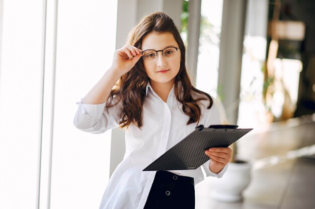 Little girl in a business style