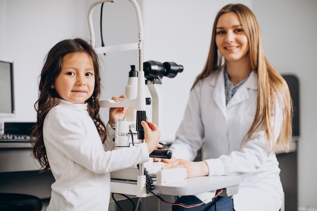 Little girl checking up her sight at ophthalmology center