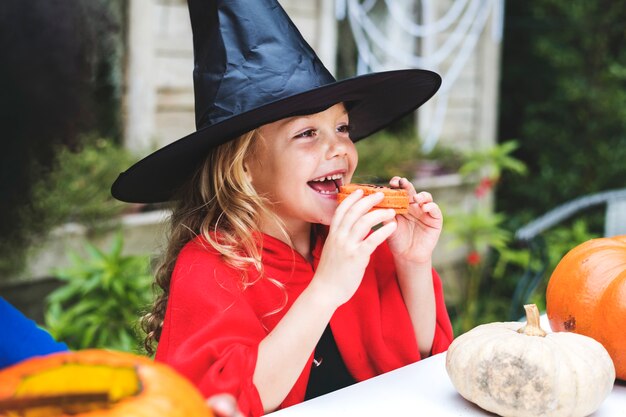 Little girl dressed up as a witch