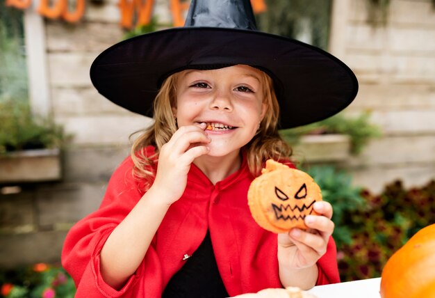 Little girl dressed up as a witch