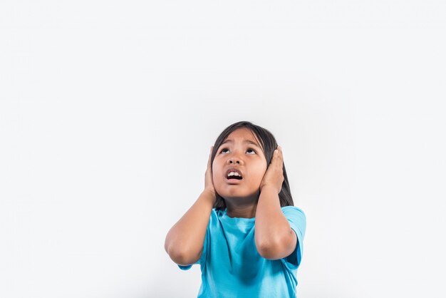 little girl feel angry in studio shot