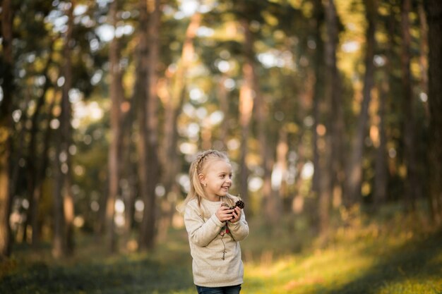 Little girl in forest