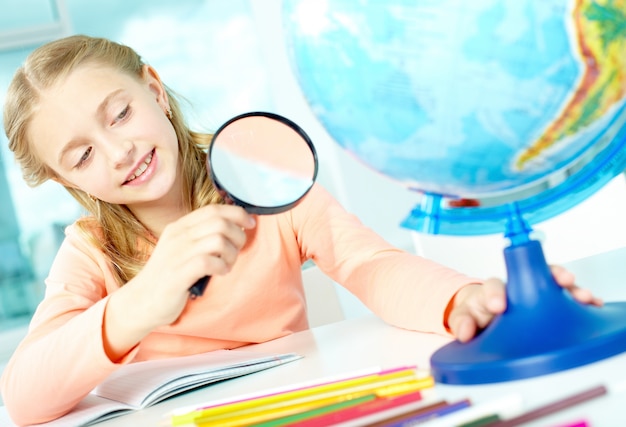 Little girl in geography class