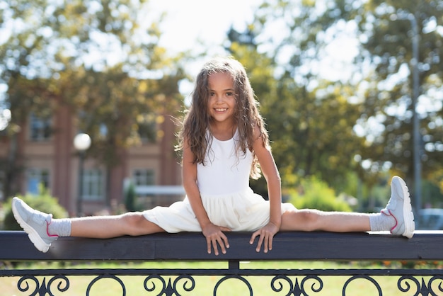 Free photo little girl having fun in park