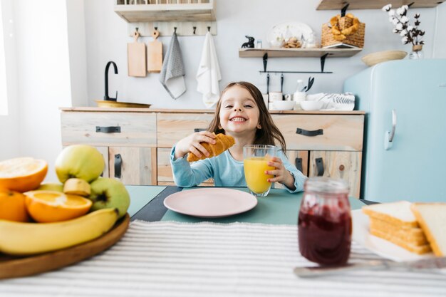 Little girl having her breakfast