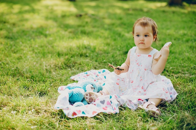 Little girl is resting in the park